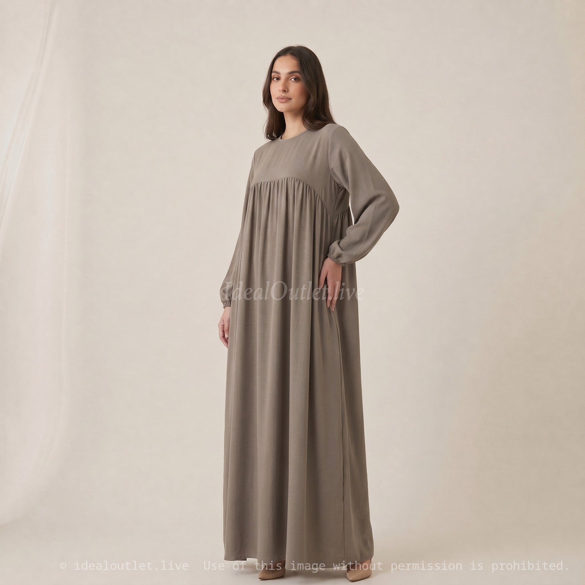 Abaya d'allaitement en jazz ouverture zip REF:RO2512JAZZ - manches bouffantes et coupe fluide facilitant l’allaitement en toute discrétion.